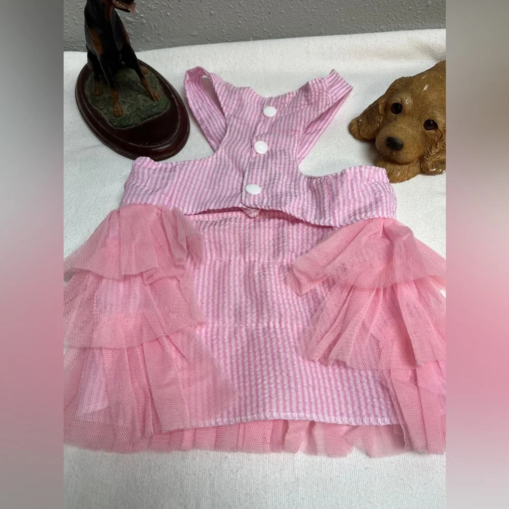 Pink and white striped ruffled dog dress with suspenders
